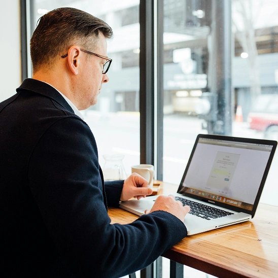 Businessman sitting at the laptop